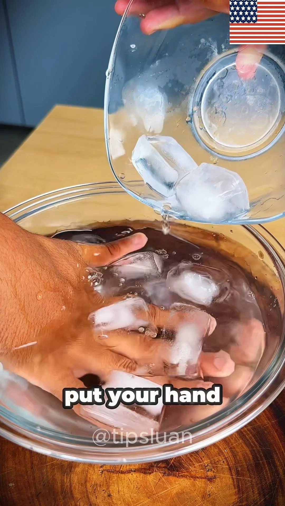 Person performing hand exercise in cold water for strength and flexibility.