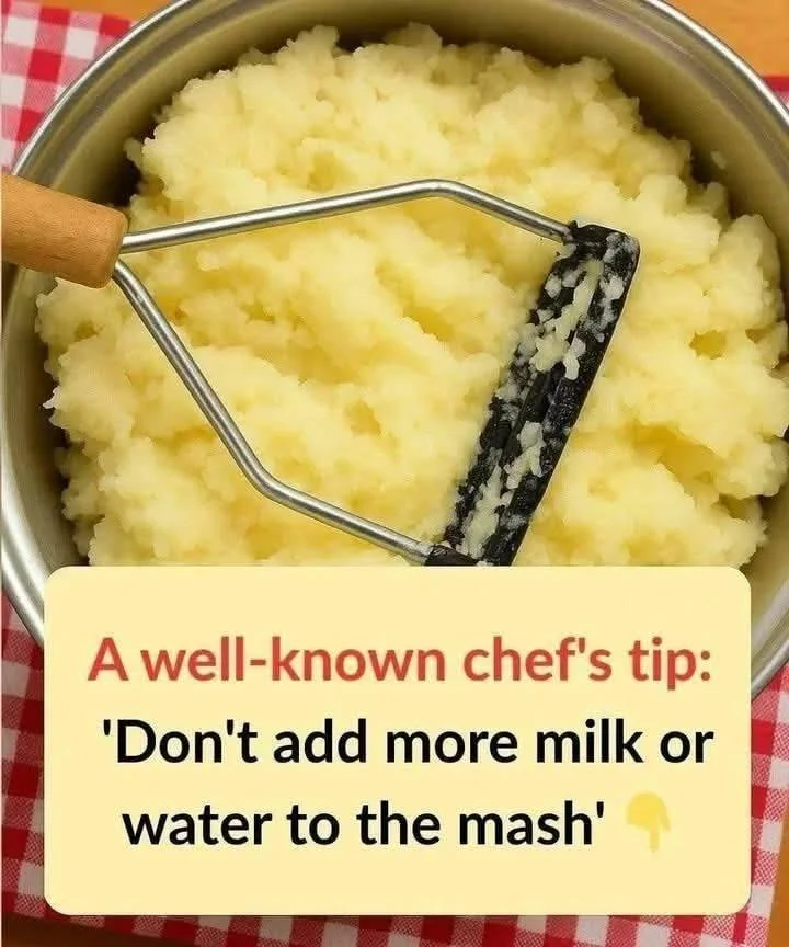 Fluffy mashed potatoes served with a drizzle of melted butter.