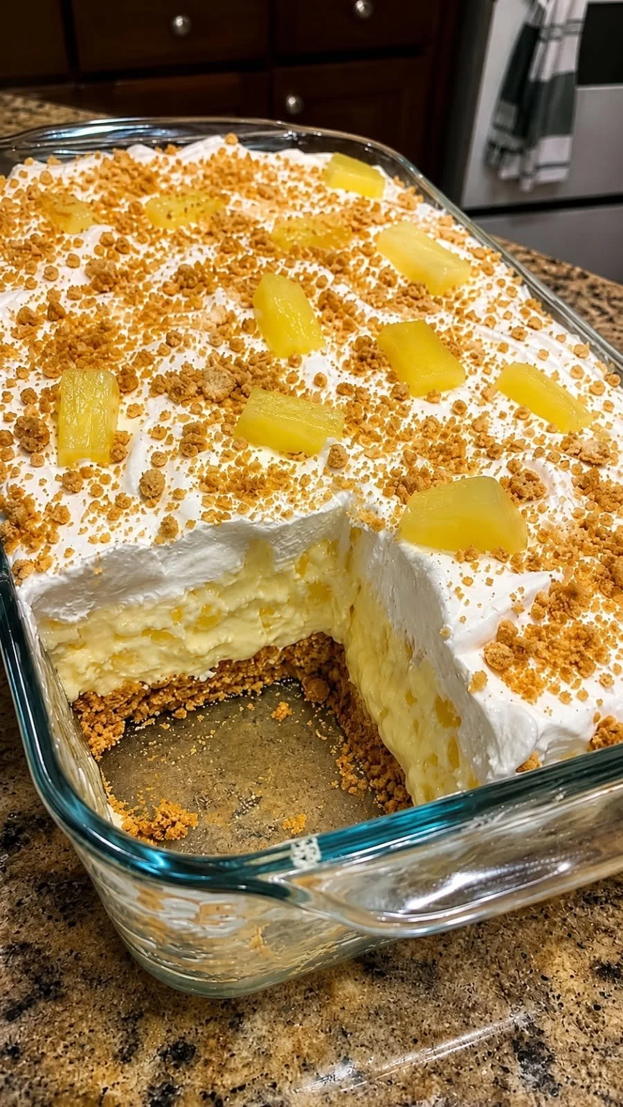 Delicious no-bake pineapple cream dessert topped with fresh pineapple slices
