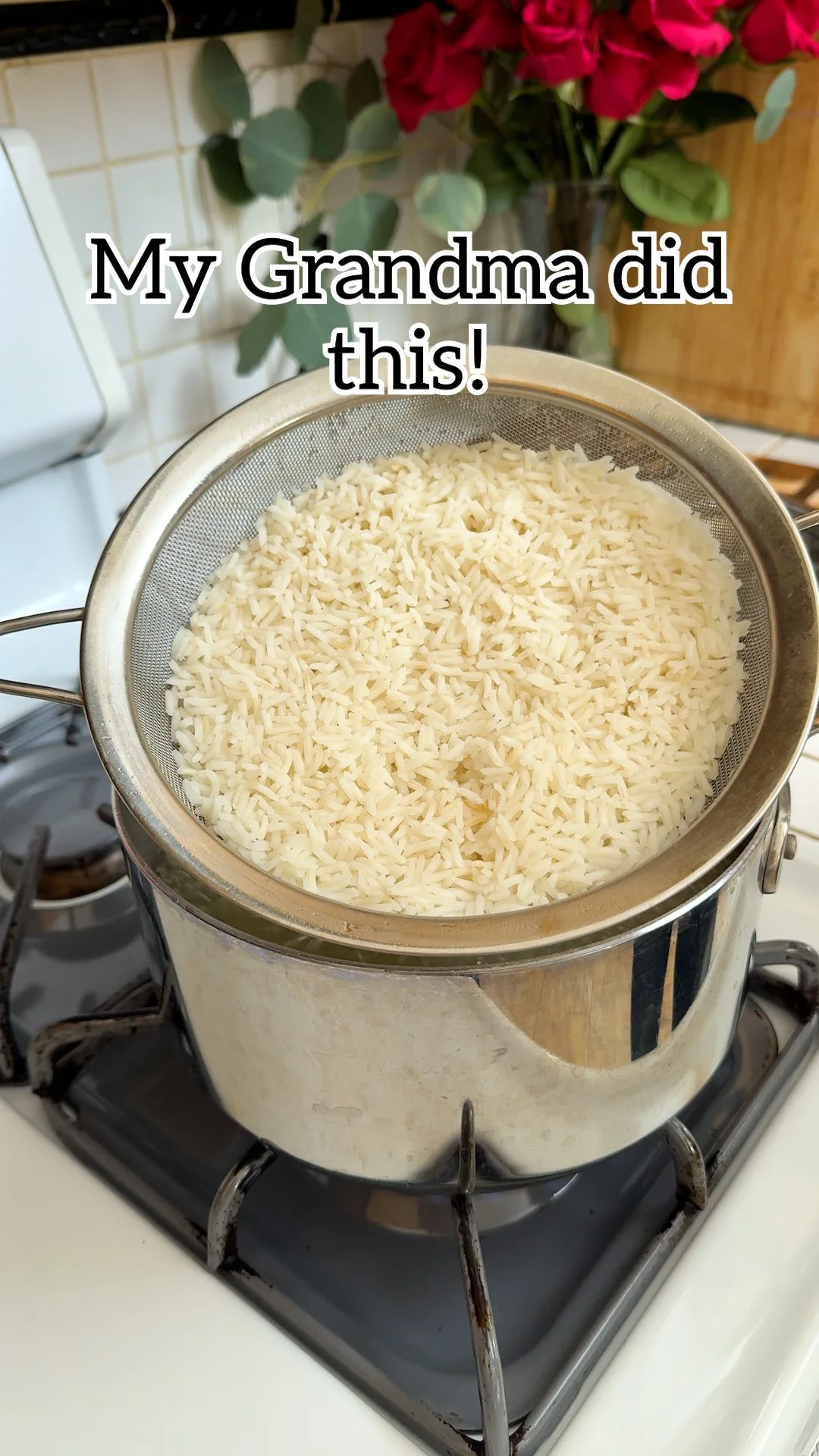 Steamed rice cooked using a fine mesh strainer in a kitchen setting
