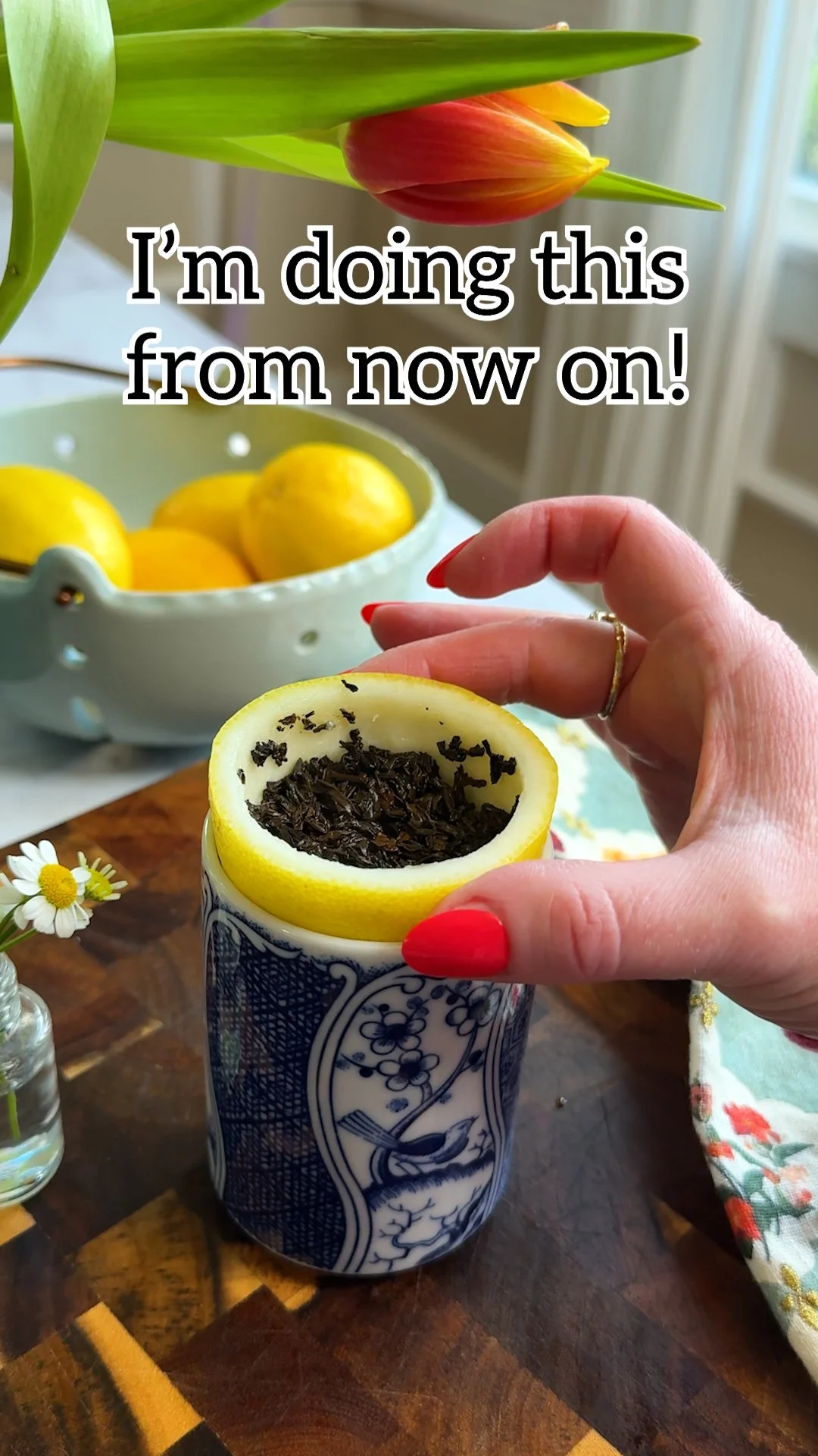 Steeping loose leaf tea with lemon peel for a flavorful infusion