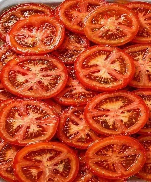 Fresh tomatoes used in various everyday dishes and recipes.