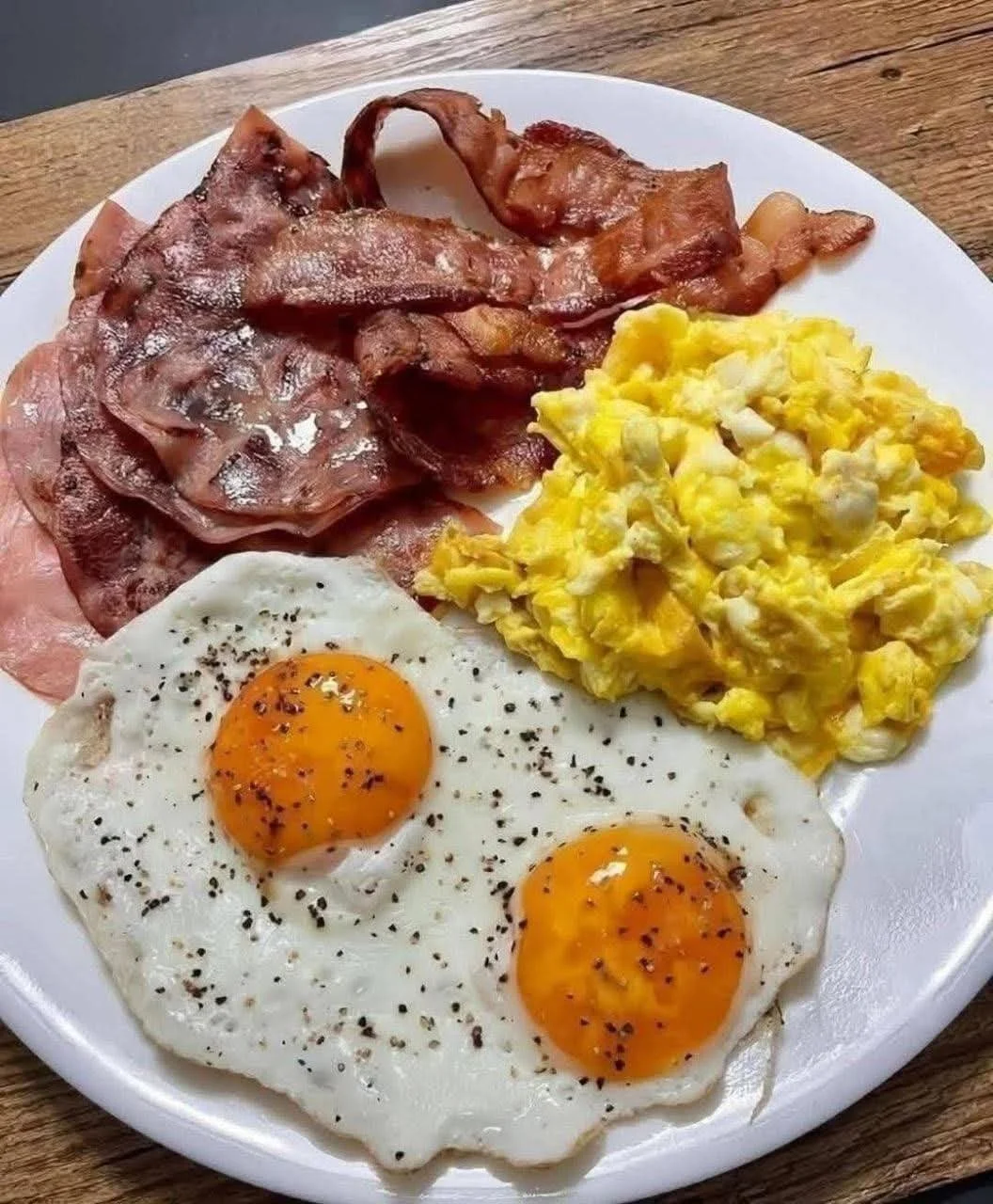 Delicious breakfast plate featuring eggs and hash browns.