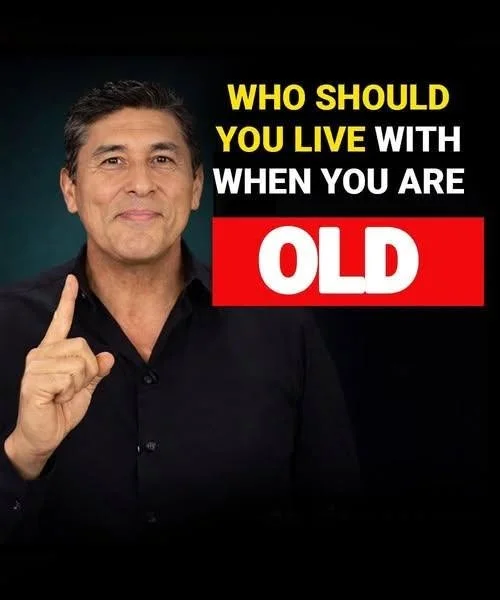 An older person living comfortably with family members at home.