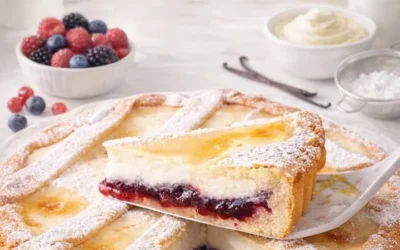 Delicious Milk Custard Tart topped with vibrant jam on a serving plate