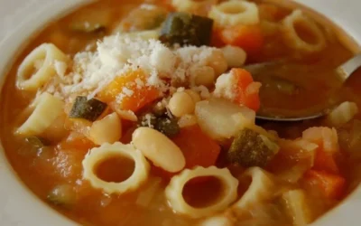 Delicious bowl of Parmesan Minestrone Soup with fresh vegetables and herbs
