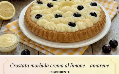Soft lemon tart topped with cream and Amarena cherries