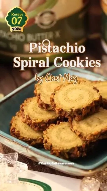 Delicious spiral pistachio cookies showcasing vibrant green pistachios and a twist design.