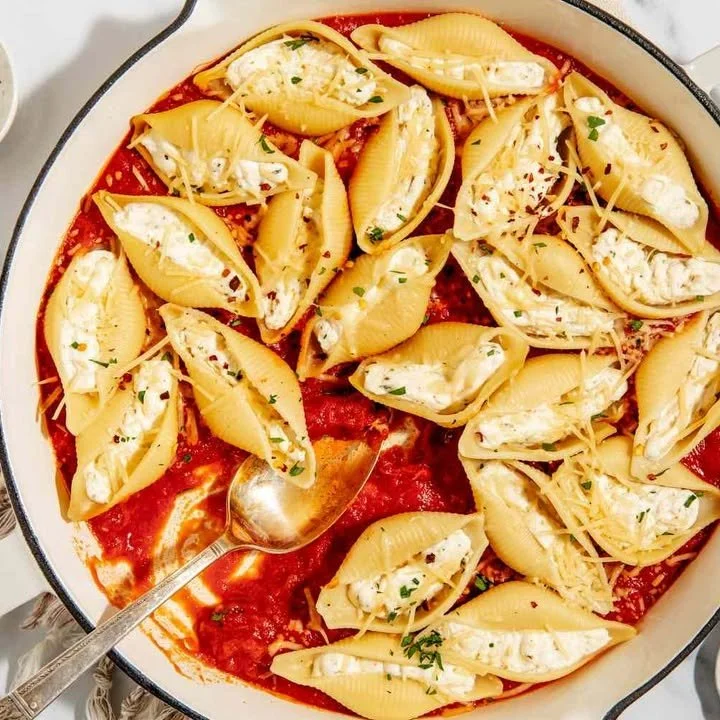 Cheesy stuffed shells filled with ricotta and topped with marinara sauce