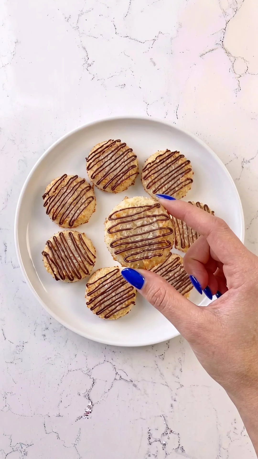 Two-ingredient banana coconut cookies on a plate